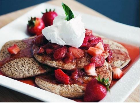 Buckwheat Pancakes with Brandied Strawberries and Coconut Whip