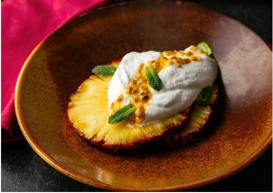Vegan coconut mousse with passion fruit, lime and roasted pineapple