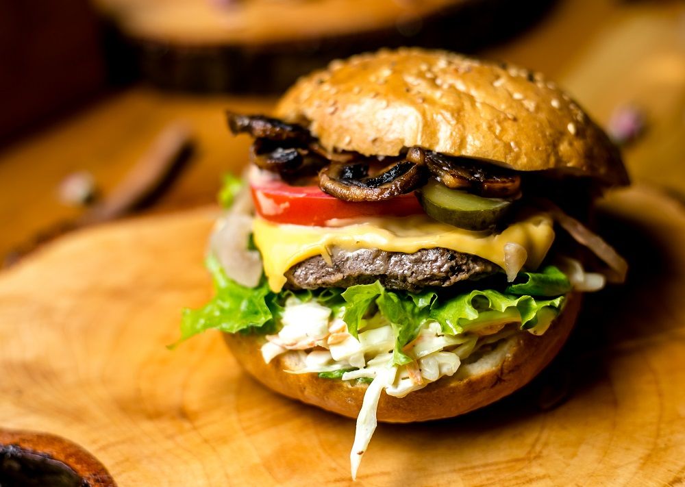 Portabella mushroom burger with bruschetta topping