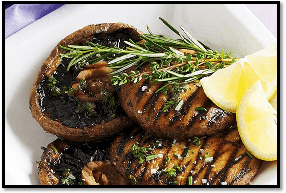 Barbecued garlic and herb mushrooms
