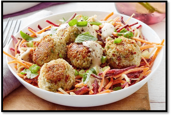 Vegan quinoa and chickpea balls with beetroot slaw