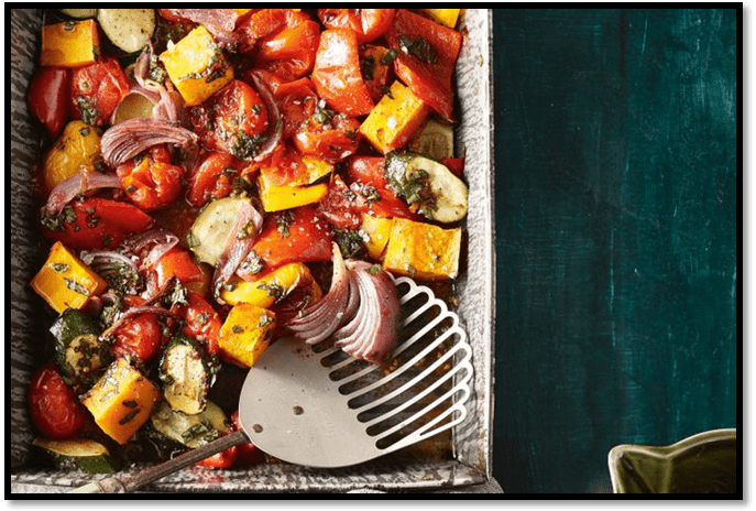 Vegetable tray bake with roasted garlic dressing