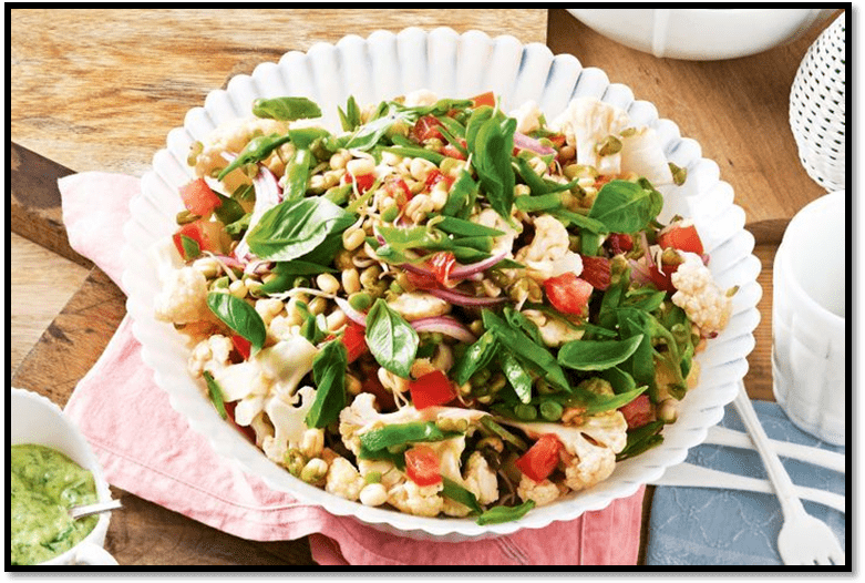 Marinated cauliflower and sprout salad with tomato dressing