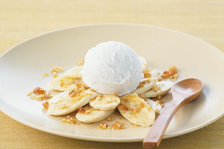 Bananas with macadamia praline and coconut sorbet